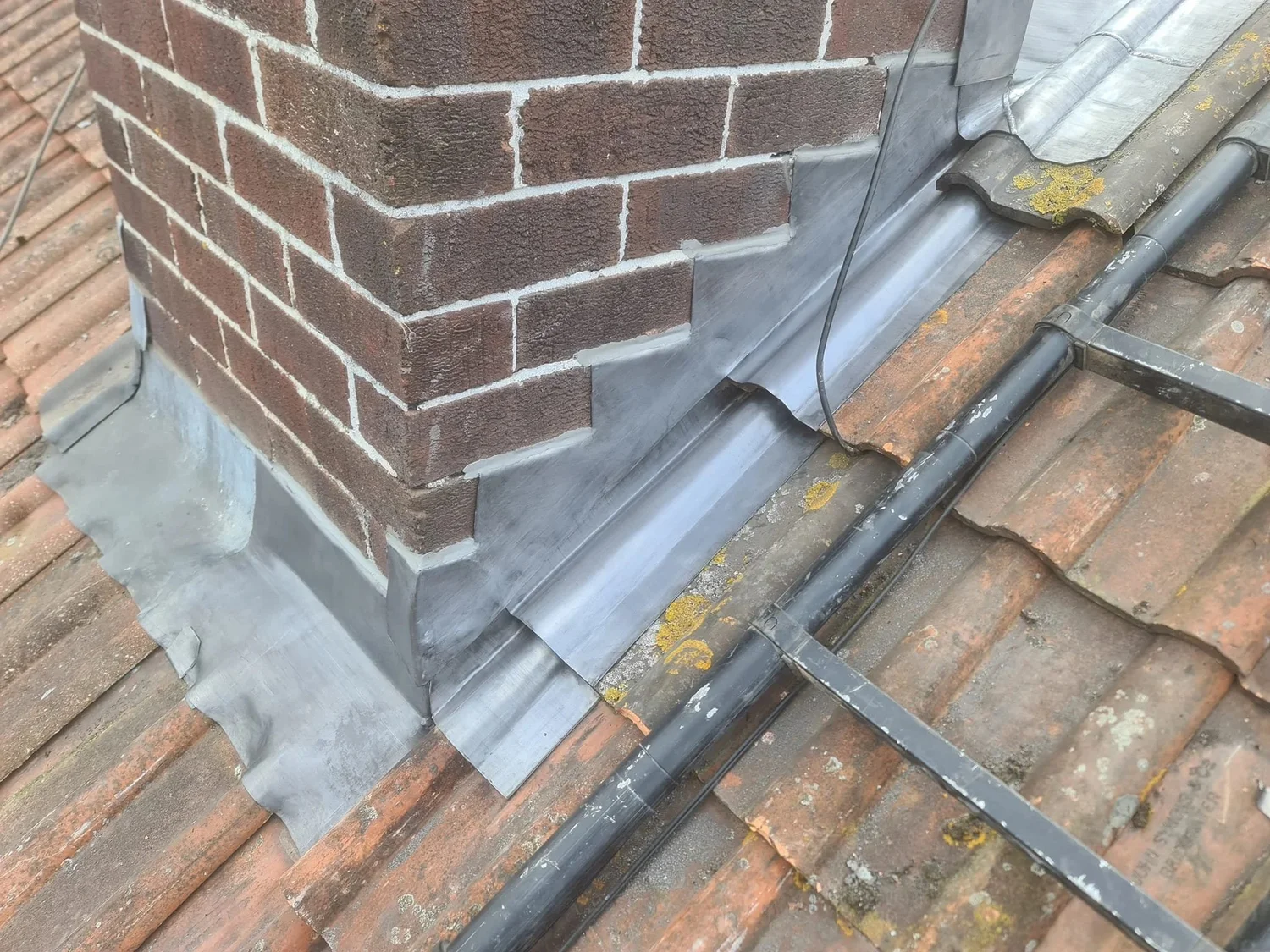 Completed chimney lead flashing photographed by Hunt's Roofing